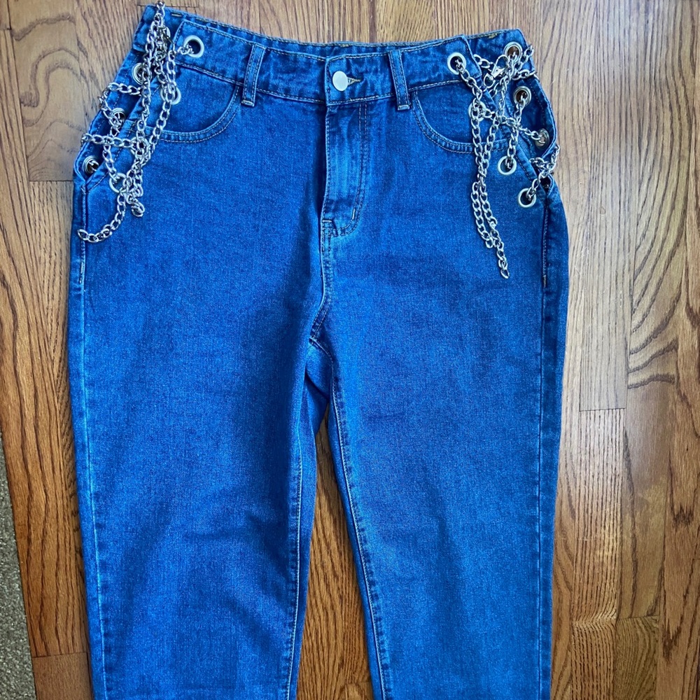 These are a boyfriend jean fit, adjustable waist.